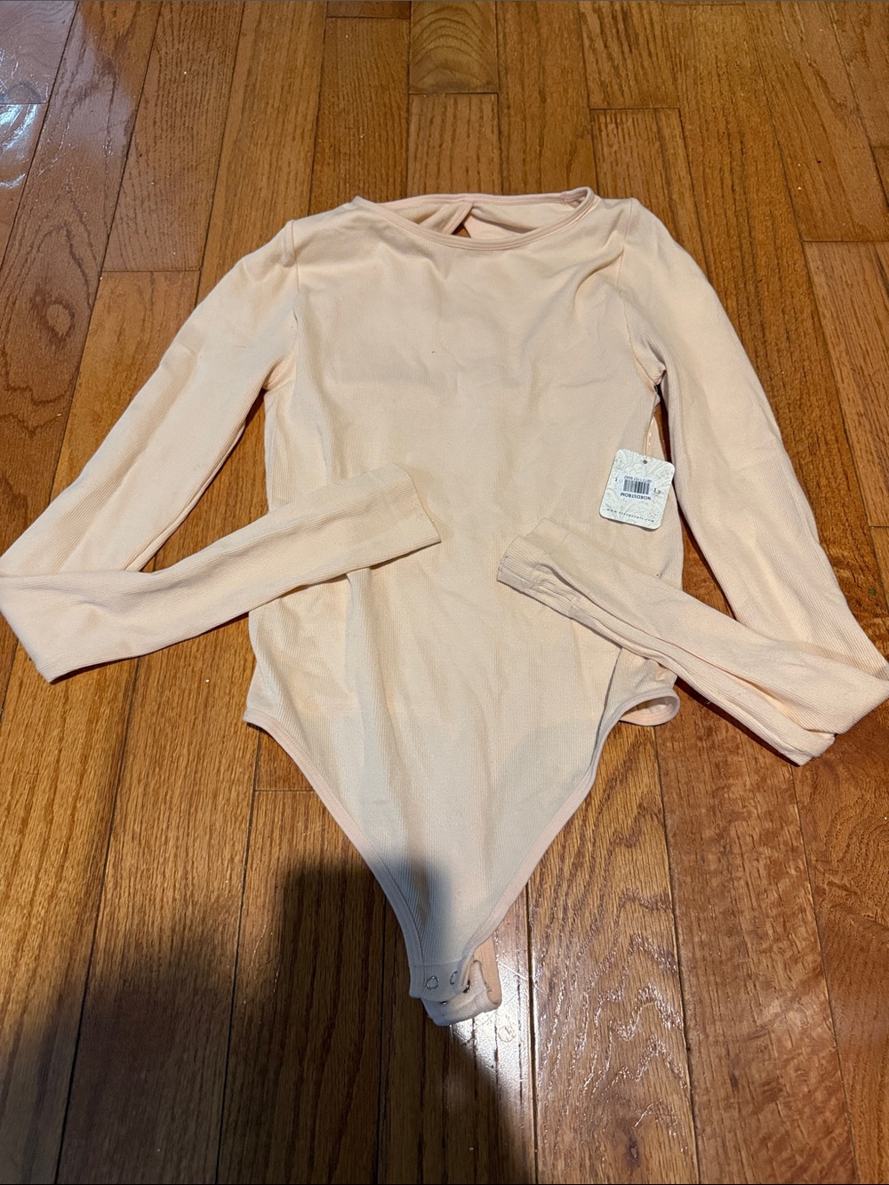 Free People Long-Sleeve One-Piece Bodysuit in Light Peach